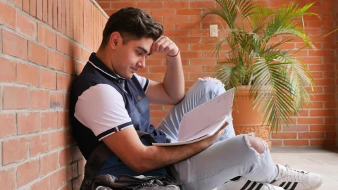 Stock Video Frustrated Student At His School Studying His Notes Live Wallpaper For PC - Free Live Wallpaper