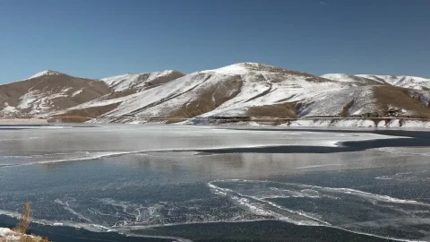 Stock Video Frozen Water Surface Of A Lake Near The Mountains Live Wallpaper For PC - Free Live Wallpaper