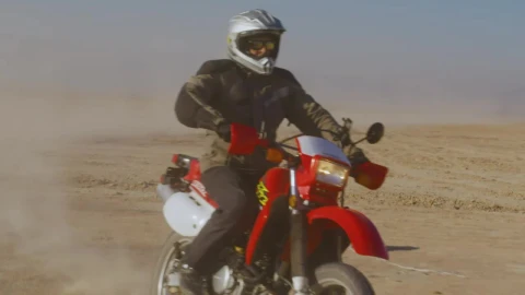 Stock Video Frontal Tracking Shot Of A Biker In The Desert Live Wallpaper For PC - Free Live Wallpaper