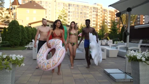 Stock Video Friends With Floats Walking Into A Pool Live Wallpaper For PC - Free Live Wallpaper