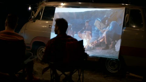 Stock Video Friends Watching A Movie Projected On The Van Live Wallpaper For PC - Free Live Wallpaper