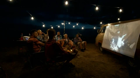 Stock Video Friends Watching A Movie At The Camp Live Wallpaper For PC - Free Live Wallpaper
