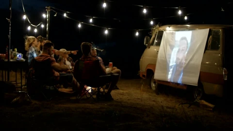 Stock Video Friends Watching A Live Stream With A Projection Live Wallpaper For PC - Free Live Wallpaper