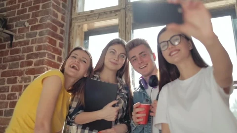 Stock Video Friends Smile For Group Selfie In Front Of Sunlit Window Live Wallpaper For PC - Free Live Wallpaper