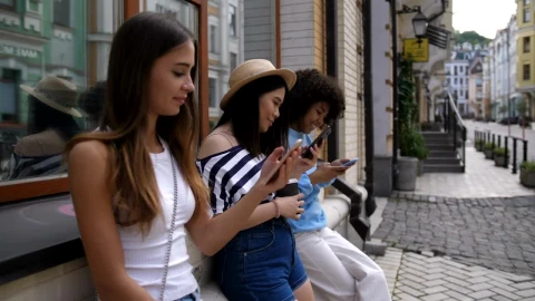 Stock Video Friends On The Street While Using Cell Phones Live Wallpaper For PC - Free Live Wallpaper