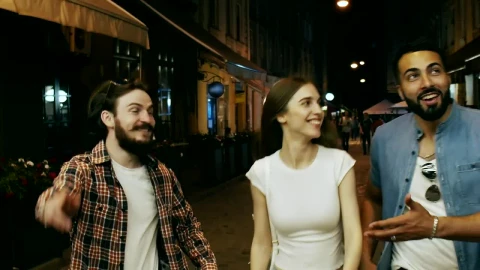 Stock Video Friends Laugh And Walk Down City Street At Night Live Wallpaper For PC - Free Live Wallpaper