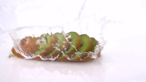 Stock Video Kiwi Sliced Into Slices Falling On Water Animated Wallpaper - Free Live Wallpaper