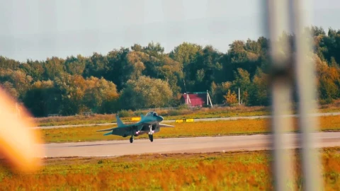 Stock Video Jet Moving In The Distance Down A Runway Animated Wallpaper - Free Live Wallpaper