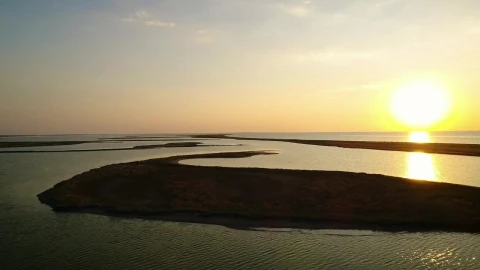 Stock Video Irregular Landforms In The Sea During Sunset Animated Wallpaper - Free Live Wallpaper