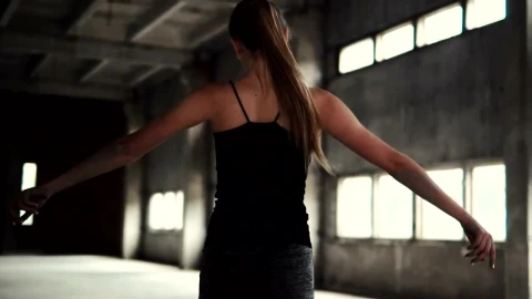 Stock Video Inspired Woman Dances In Warehouse Animated Wallpaper - Free Live Wallpaper