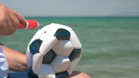 Stock Video Inflating A Ball For A Beach Game Animated Wallpaper - Free Live Wallpaper