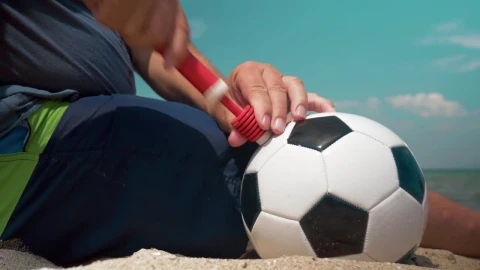 Stock Video Inflating A Ball At The Beach Animated Wallpaper - Free Live Wallpaper