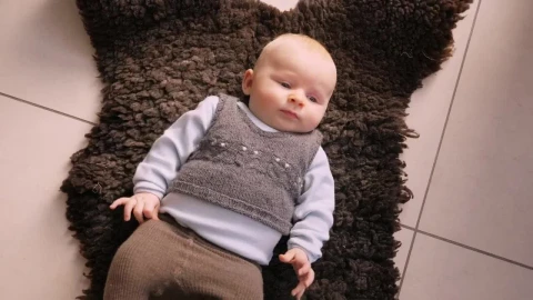 Stock Video Infant Laying On A Rug Animated Wallpaper - Free Live Wallpaper