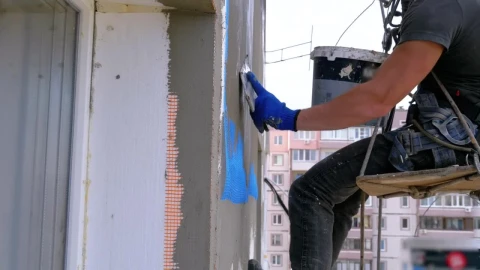 Stock Video Industrial Climbers Applying Cement To A Building Animated Wallpaper - Free Live Wallpaper