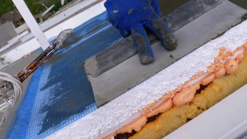 Stock Video Industrial Climber Working On A Wall Of A Building Animated Wallpaper - Free Live Wallpaper