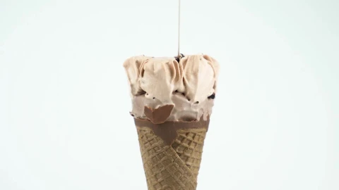 Stock Video Icecream Cone With Syrup On A Light Background Animated Wallpaper - Free Live Wallpaper
