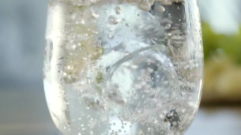 Stock Video Ice Cube Drops Into Mineral Water Animated Wallpaper - Free Live Wallpaper