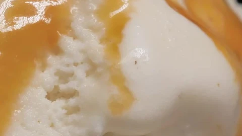 Stock Video Ice Cream With Caramel On A Black Background Animated Wallpaper - Free Live Wallpaper