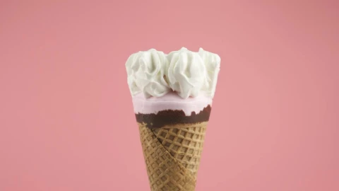 Stock Video Ice Cream Cone With Syrup On A Pink Background Animated Wallpaper - Free Live Wallpaper