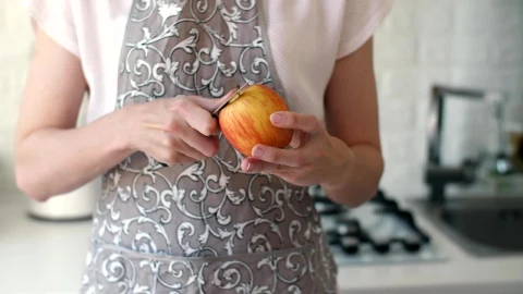 Stock Video Housewife Peeling An Apple With A Knife Animated Wallpaper - Free Live Wallpaper