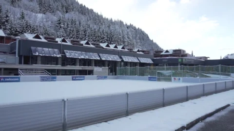 Stock Video Hotel In The Mountains With Sports Field Covered In Snow Animated Wallpaper - Free Live Wallpaper