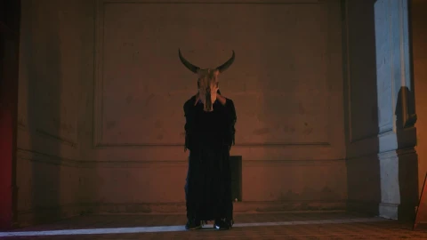 Stock Video Hooded Person In Old Room With Bull Skull Animated Wallpaper - Free Live Wallpaper