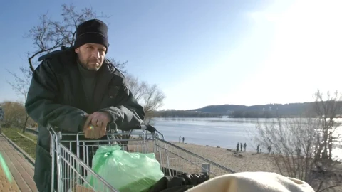 Stock Video Homeless Man With A Cart Of Plastic Bags Animated Wallpaper - Free Live Wallpaper