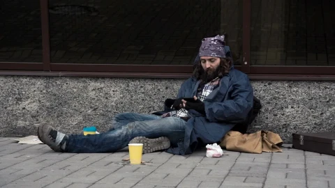 Stock Video Homeless Man Using Smartphone On The Street Animated Wallpaper - Free Live Wallpaper