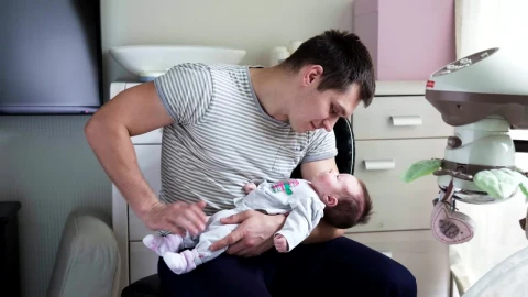 Stock Video Holding His Newborn Child In His Arms Animated Wallpaper - Free Live Wallpaper