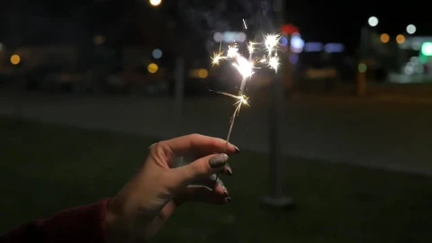 Stock Video Holding A Sparkler At Night Animated Wallpaper - Free Live Wallpaper