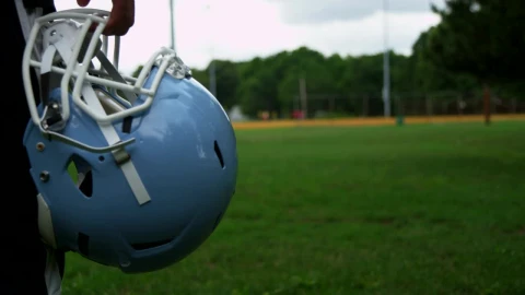 Stock Video Holding A Football Helmet At A Court Animated Wallpaper - Free Live Wallpaper