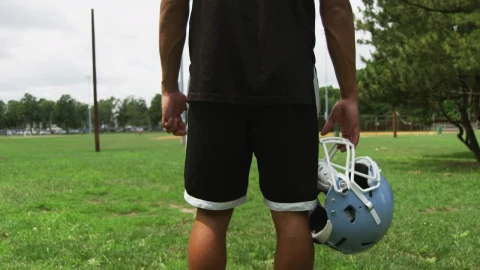 Stock Video Holding A Football Helmet Animated Wallpaper - Free Live Wallpaper