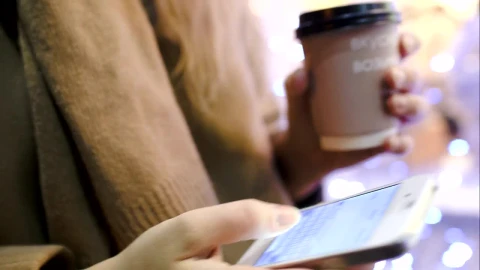 Stock Video Holding A Coffee And Texting Animated Wallpaper - Free Live Wallpaper