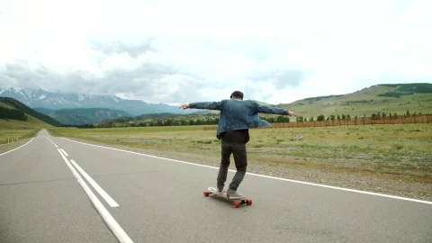 Stock Video Hipster Man On A Longboard On The Road Animated Wallpaper - Free Live Wallpaper