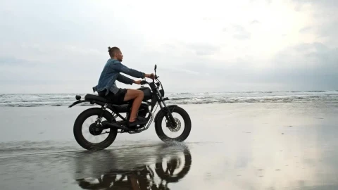 Stock Video Hipster Biker Riding A Motorcycle Near The Seashore Animated Wallpaper - Free Live Wallpaper
