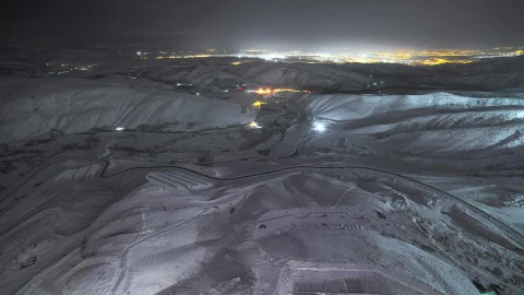 Stock Video Hills Covered In Snow With The City Lights In The Animated Wallpaper - Free Live Wallpaper