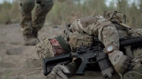 Stock Video Helping A Wounded Soldier In The Battlefield Animated Wallpaper - Free Live Wallpaper
