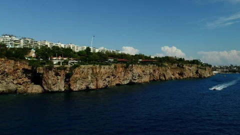 Stock Video Helicopter Racing A Boat Along The Coast Animated Wallpaper - Free Live Wallpaper