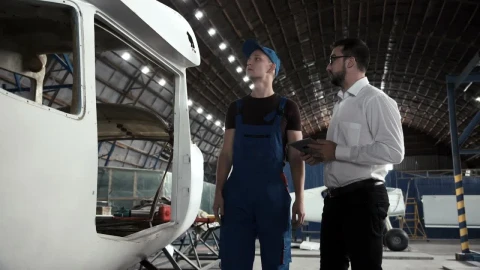 Stock Video Having A Conversation In The Hangar Animated Wallpaper - Free Live Wallpaper