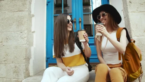 Stock Video Happy Women Toast And Drink Coffee On Steps Animated Wallpaper - Free Live Wallpaper