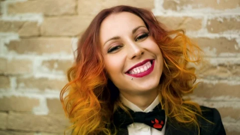 Stock Video Happy Woman Wearing Dress And Black Bow Tie Animated Wallpaper - Free Live Wallpaper