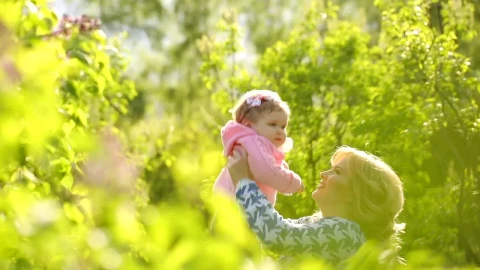 Stock Video Happy Woman Throws Her Daughter In The Air Animated Wallpaper - Free Live Wallpaper