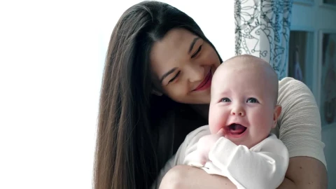 Stock Video Happy Mother Hugging Her Baby Animated Wallpaper - Free Live Wallpaper