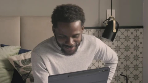 Stock Video Happy Man Chatting By Video Call On A Tablet Animated Wallpaper - Free Live Wallpaper