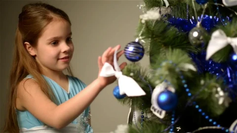 Stock Video Happy Little Girl Next To A Christmas Tree Animated Wallpaper - Free Live Wallpaper
