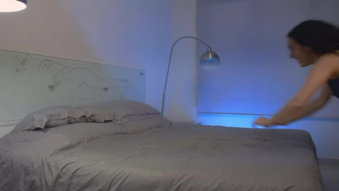 Stock Video Happy Girl Throws Herself On A Bed Animated Wallpaper - Free Live Wallpaper