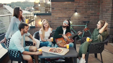 Stock Video Happy Friends Spending Time Together On A Rooftop Animated Wallpaper - Free Live Wallpaper
