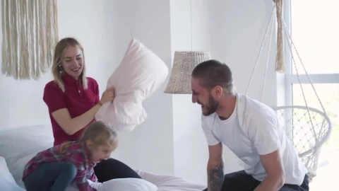 Stock Video Happy Family Playing With Pillows Animated Wallpaper - Free Live Wallpaper