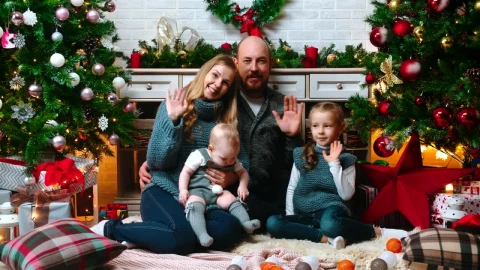 Stock Video Happy Family Greeting At The Camera On Christmas Animated Wallpaper - Free Live Wallpaper