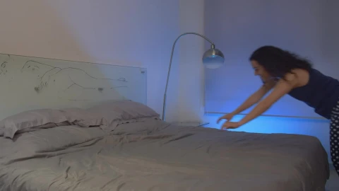 Stock Video Happy Couple Pulling Together On A Bed Animated Wallpaper - Free Live Wallpaper